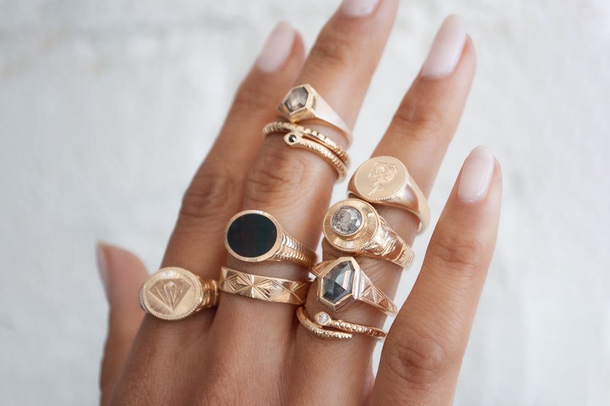 Wedding Ring Idea Question: Is it possible to find a jewelry maker that can  embed my petite engagement ring diamond and center it within the onyx like  this? : r/jewelrymaking